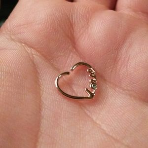 Daith and/or helix piercing.